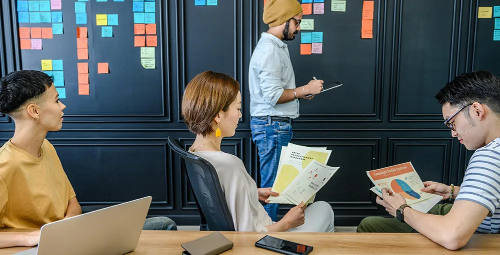 people in work meeting for team project
