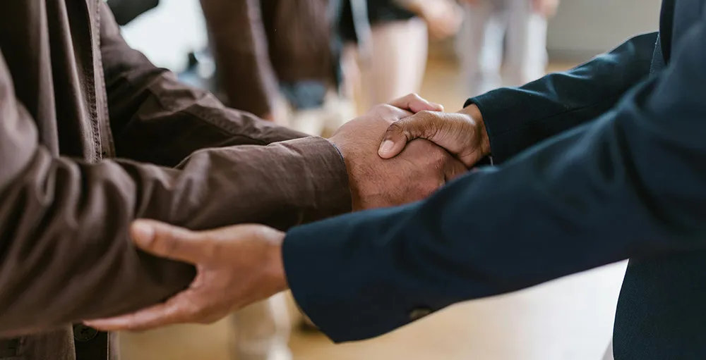 men shaking hands