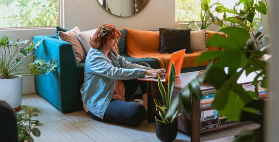 woman using her laptop at home